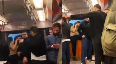 Metroda utanç verici görüntüler! Giyimini beğenmediği gençlere hakaret edip saldırdı