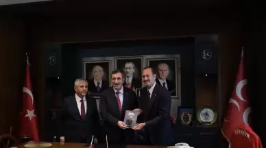 Cumhurbaşkanı Yardımcısı Yılmaz MHP İzmir il başkanlığını ziyaret etti