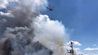 Helikopterler çöplük yangını için kalktı